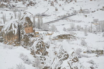 Breathtaking view of Valley in winter season, Cappadocia national park, Turkey. Heavy snow fall during christmas time.