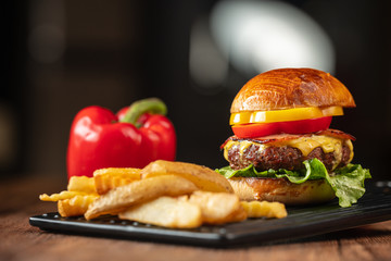 Fresh home-made hamburger served on wood