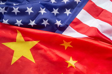 Top view of American flag and China flag together. International relationship. Trade war. Concept for Economy, connection, partnership, relationship and friendship.