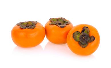 ripe persimmons isolated on white background