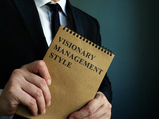 Businessman is holding notice Visionary Management Style.