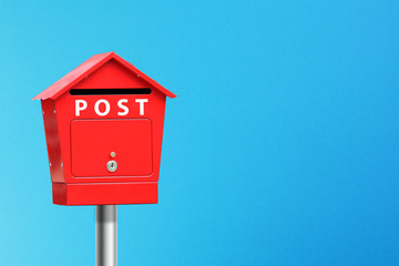 Postbox on a blue background