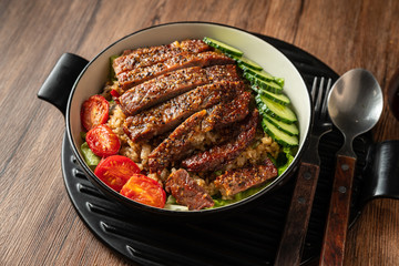 plum bbq sauce pork chop with broccoli and steamed brown rice