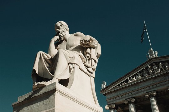 Statue of the ancient Greek philosopher Socrates in Athens, Greece.	