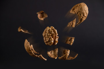 walnut explosion on a dark background