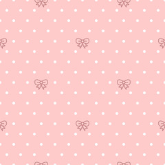 Cute bow and polka dots seamless pattern on a pink background