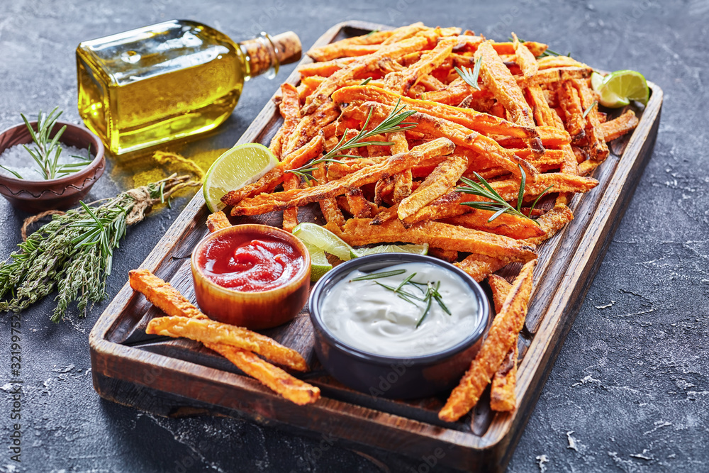 Canvas Prints crispy salty Sweet Potato Fries on a board