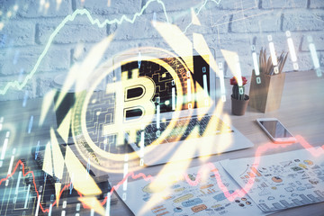Double exposure of blockchain theme hologram and table with computer background. Concept of bitcoin...