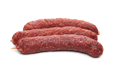 Fermented, dry sausages isolated on white background