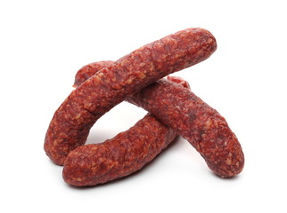 Fermented, dry sausages isolated on white background
