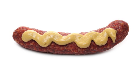 Fermented, dry sausage with mustard sauce isolated on white background