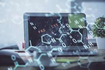 Desktop computer background and formula hologram writing. Double exposure. Education concept.