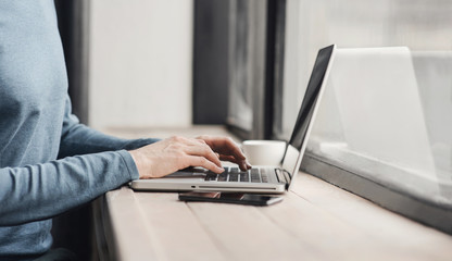 Businessman working on computer. Man using laptop in the office. Internet marketing, finance, business concept