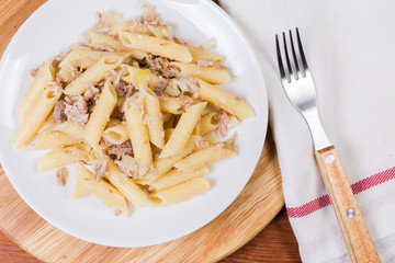 Top view of pasta with minced pork in navy-style