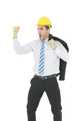 Standing smart engineer in white shirt wearing yellow helmet showing fist and shouting isolated on white background