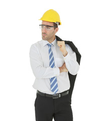 Standing smart engineer in white shirt arm touching body wearing yellow helmet and safety glasses isolated on white background