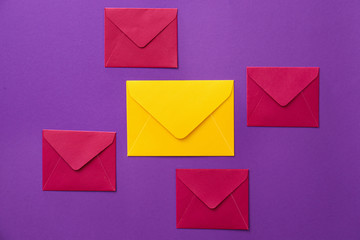 Paper envelopes on color background