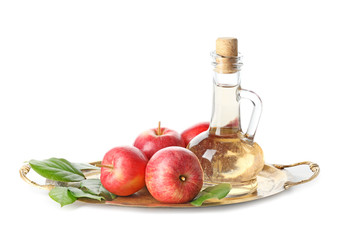 Bottle of apple cider vinegar on white background