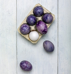 Egg box with easter eggs.