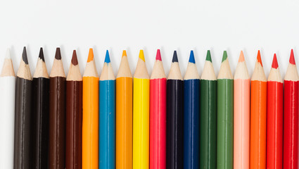 Multi color pencils. the concept of a multinational family and equality in the world.
