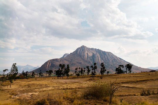 Valley with rice fields and mountains on a cloudy day at sunset, Fianarantsoa, Madagascar
