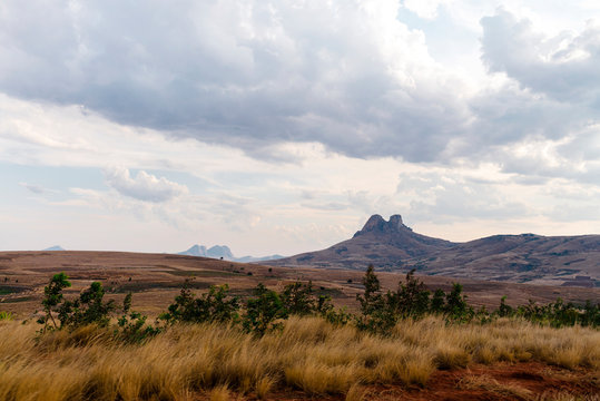 Desserted landscape of dry hills on a cloudy day at sunset, Fianarantsoa, Madagascar