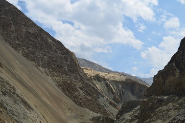 the view of Himalaya mountains on a sunny day under the blue sky in the morning or the evening in Tibet India China the road on high altitudes