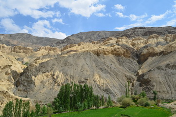 the view of Himalaya mountains on a sunny day under the blue sky in the morning or the evening in Tibet India China the road on high altitudes