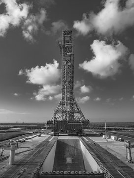 Grayscale vertical shot of a tall tower that will hold the SLS rocket in Kennedy Space Center