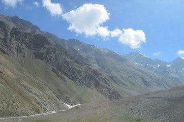 the view of Himalaya mountains on a sunny day under the blue sky in the morning or the evening in Tibet India China the road on high altitudes