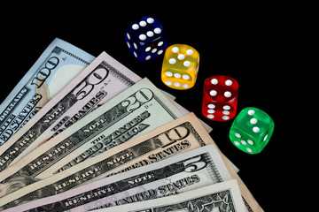 colored DICE on the dollar on black background