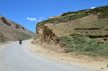 the view of Himalaya mountains on a sunny day under the blue sky in the morning or the evening in Tibet India China the road on high altitudes