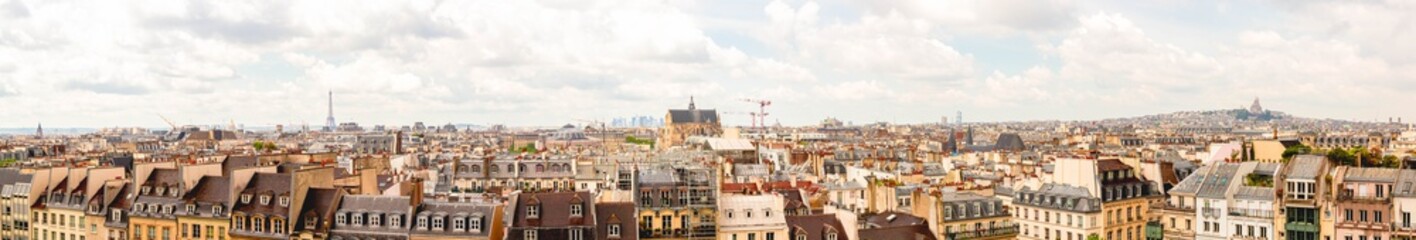 Panoramic view, aerial skyline of Paris on city center, Eiffel Tower, Sacre Coeur Basilica, churches and cathedrals, architecture, roofs of houses, streets landscape, Paris, France