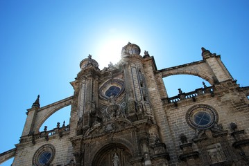 Obraz premium View of the top front of San Salvador Cathedral against a blue sky, Jerez de la Frontera, Spain.