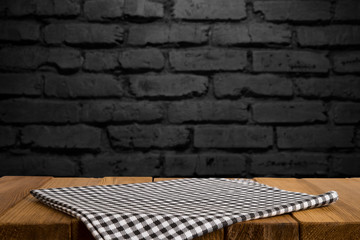 Empty brown wooden table and blur background of abstract of resturant lights people enjoy eating ,can be used for montage or display your products
