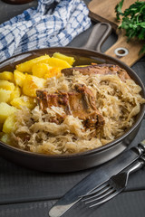 Fried ribs in sauerkraut.