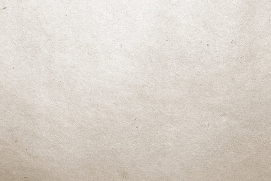 Old textured paper with a beige tint. Space for lettering or design.