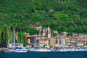 Boat parking city Salo, Italy. Lake Garda, mountains