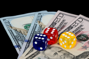colored DICE on the dollar on black background