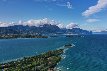 Panoramic view of the island of San Biagio, Italy. Lake Garda, blue sky	