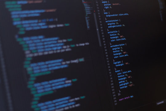 Close-up coding html and programming on screen