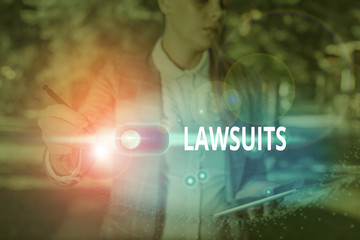 Handwriting text Lawsuits. Conceptual photo a claim or dispute brought to a law court for...