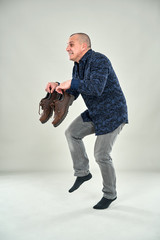 Man sneaking around tiptoeing