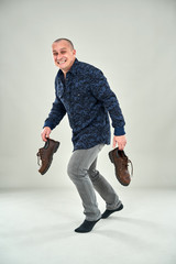 Man sneaking around tiptoeing