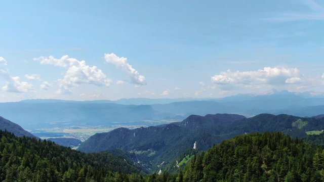 Aerial dolly in view above the forest on mountain prevala in slovenia