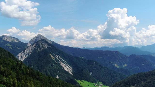 High angle aerial view of forests, peaks and meadows on mount Prevala
