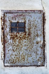 Texture of old paint on rusty metal light box