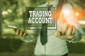 Handwriting text Trading Account. Conceptual photo investment account having securities cash or other holdings Handsome business girl pointing with finger into empty space