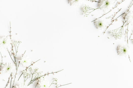 Flowers composition. White flowers on white background. Spring concept. Flat lay, top view, copy space