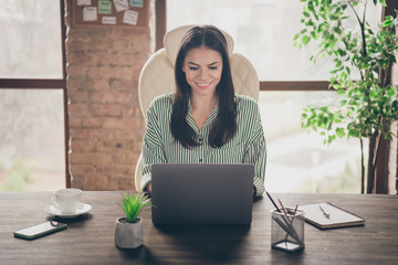 Portrait of her nice attractive focused busy cheerful cheery lady pr hr executive director creating...